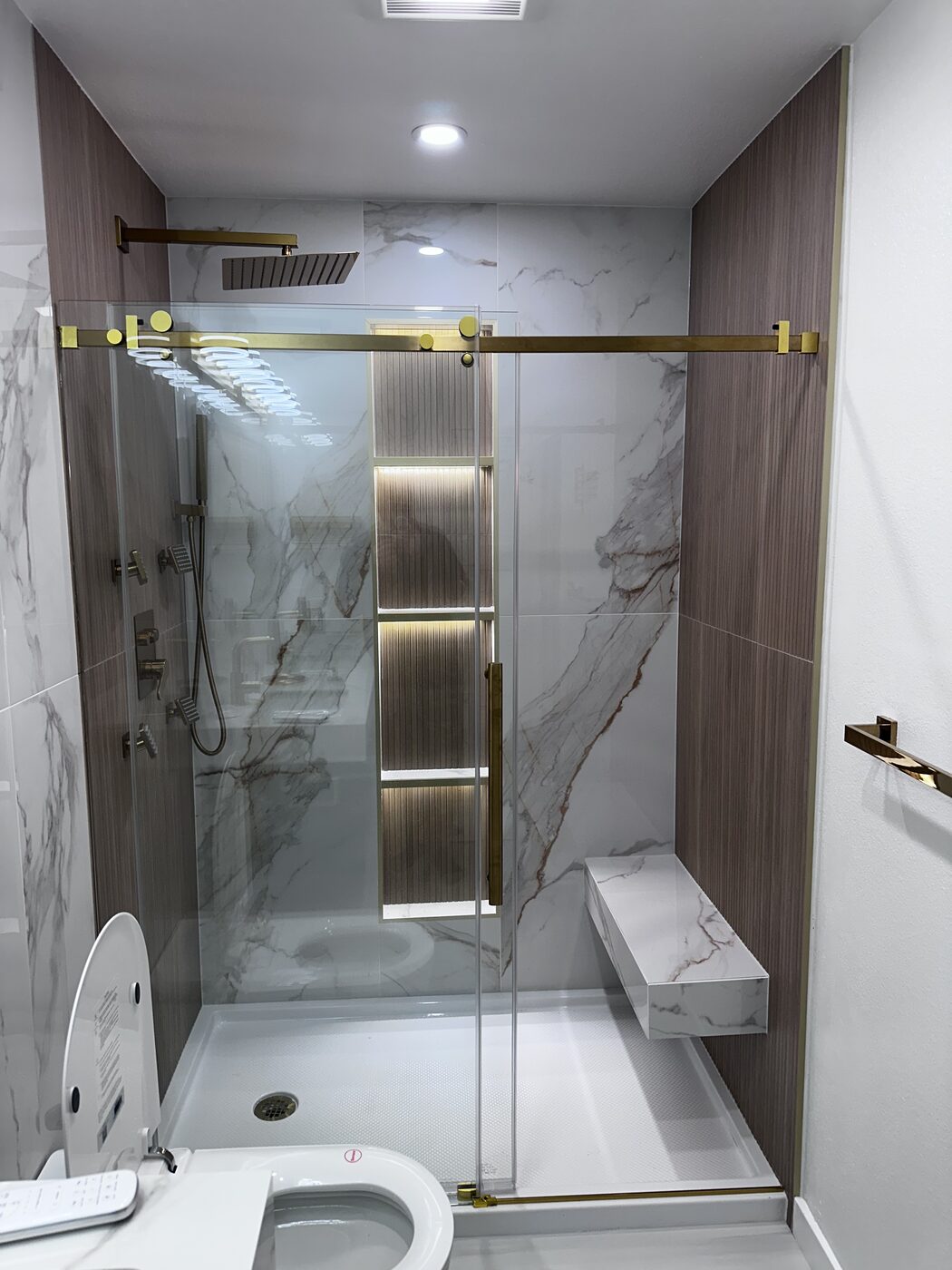Glass shower, brass details