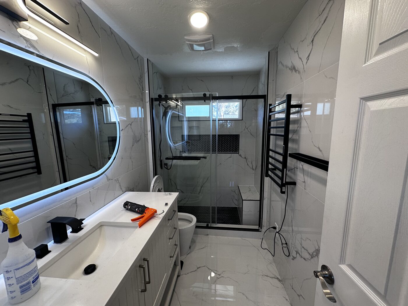 Vanity with backlit mirror